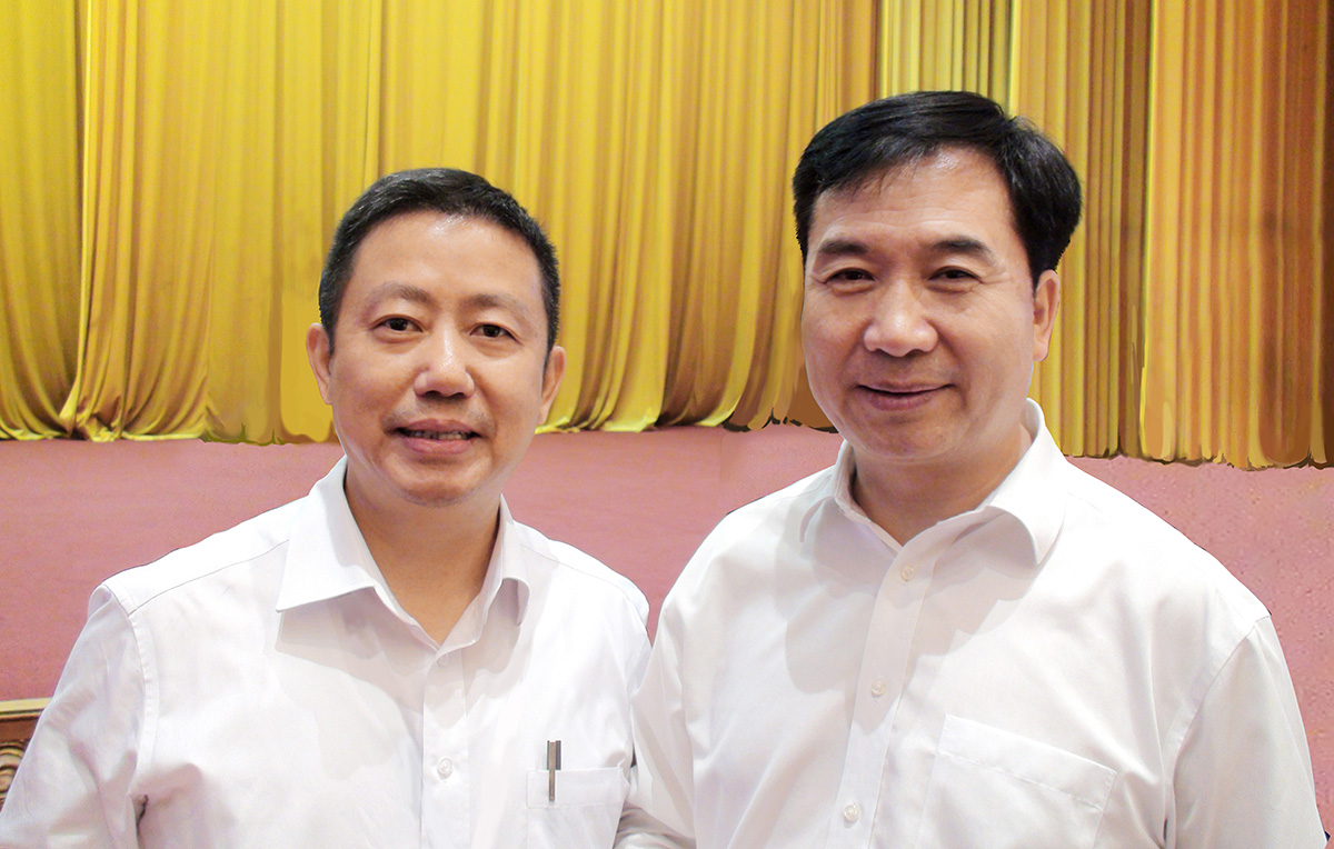 中央政治局常委、中央紀(jì)律檢查委員會書記李希與周海江合影